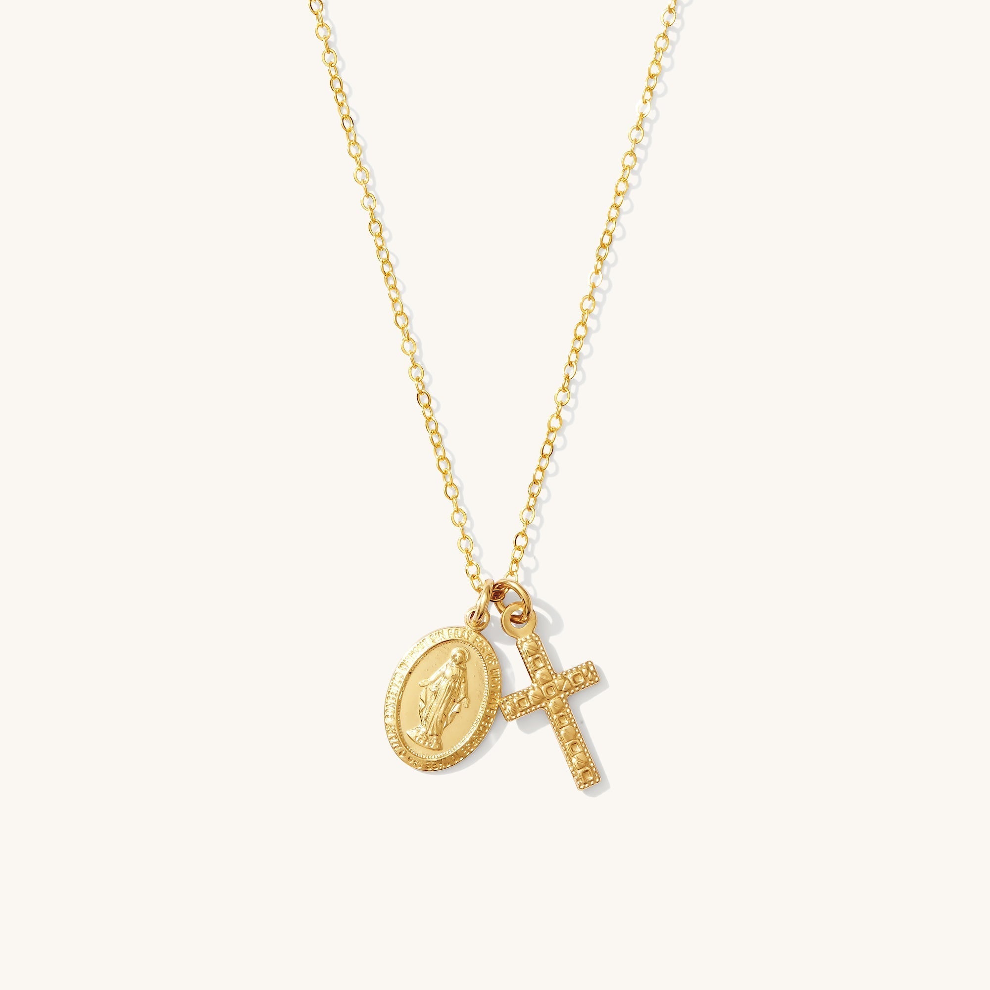 Kleiner Anhänger mit der Muttergottes und Kreuz