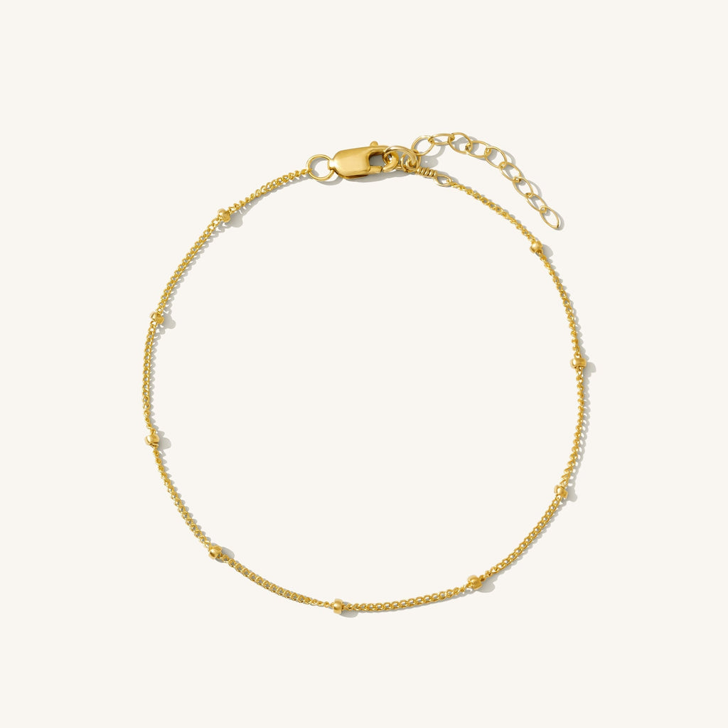 Zarte Armbanduhr mit Satellitenkette